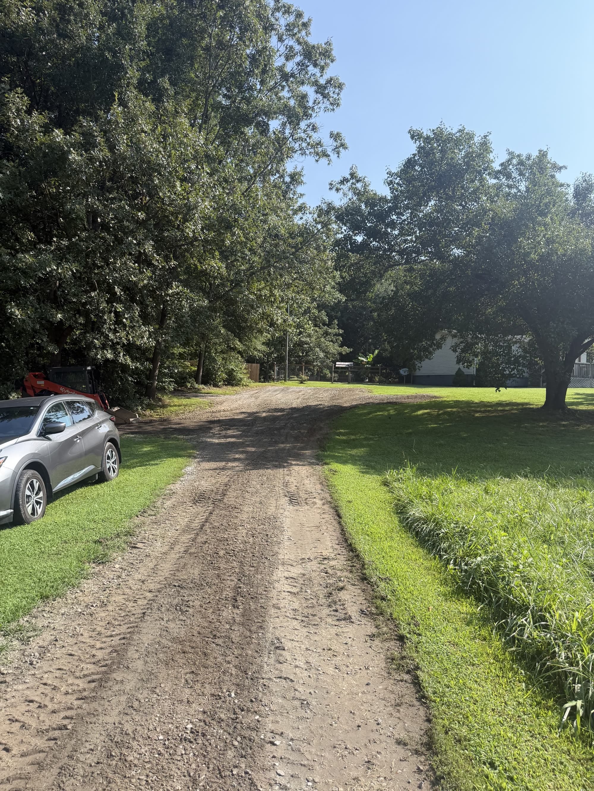 Residential driveway being graded